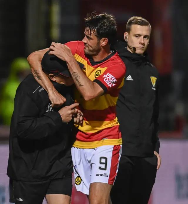 Ian McCall and Brian Graham share a loving embrace after the striker bagged a brace against Inverness