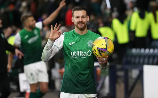 Martin Boyle celebrates his hat-trick at Hampden