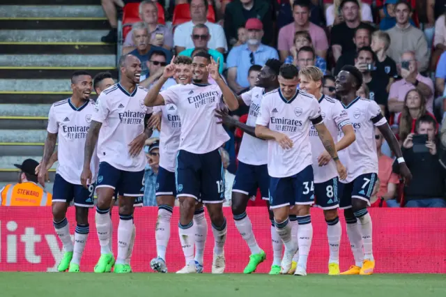 William Saliba of Arsenal celebrates with team