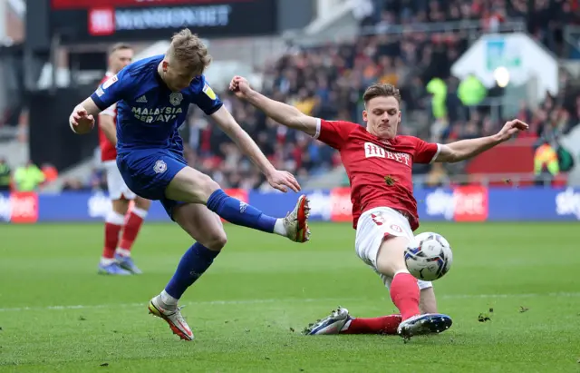 Tommy Doyle of Cardiff City is tackled by Cameron Pring of Bristol City in action from last season