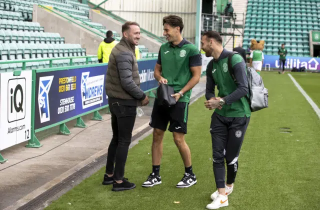 Martin Boyle and Joe Newell share a joke with Aiden McGeady, who is out injured at the moment