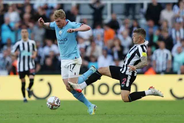 Kieran Trippier fouls Kevin de Bruyne