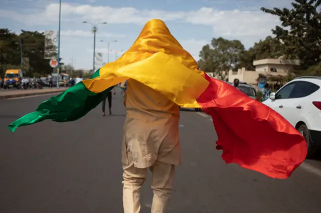 Man with Malian flag