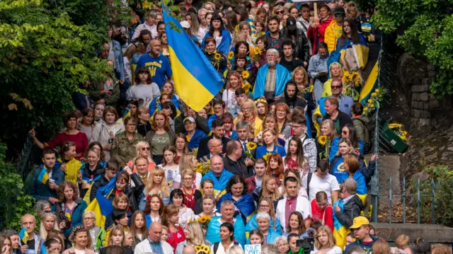 People gathered for a Ukraine independence rally alongside the Volodomyr Velacky monument at Edinburgh's Calton Hill