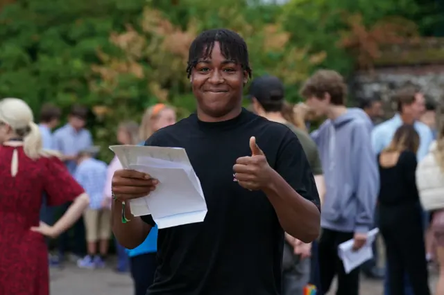 A big thumbs up from Jonathan receiving his GCSE results at Norwich School in Norfolk