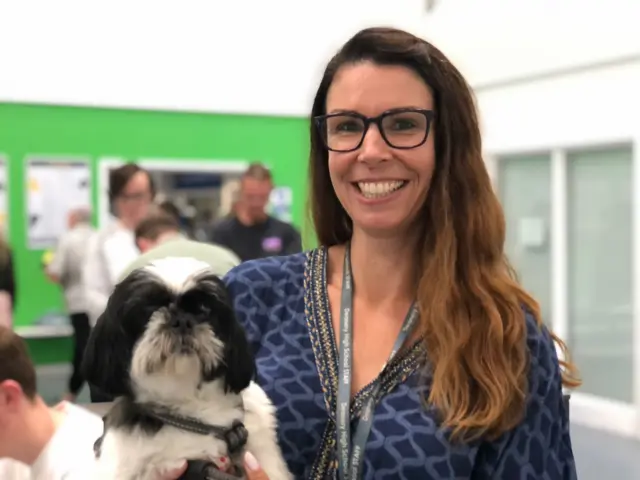 Adele Normington with her miniature Shih-Tzu, school therapy dog Minnie, at The Deanery Church of England High School in Wigan