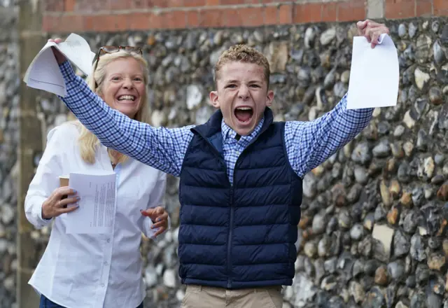 Delighted student Finney gets his GCSE results at Norwich School in Norfolk