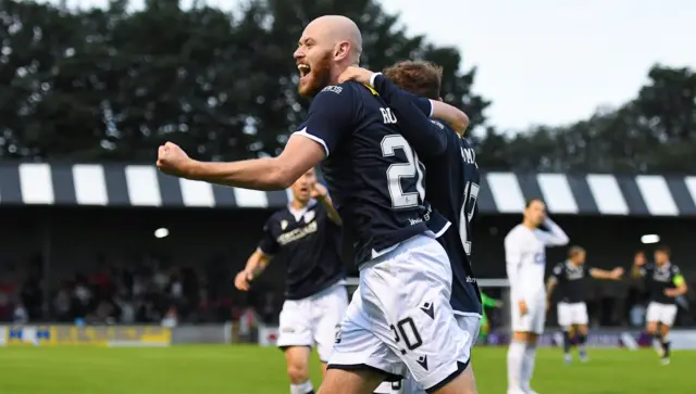 Dundee's Zak Rudden celebrates his goal