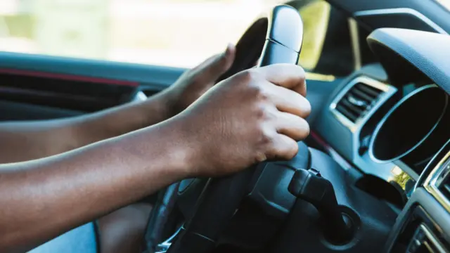 Hands on steering wheel