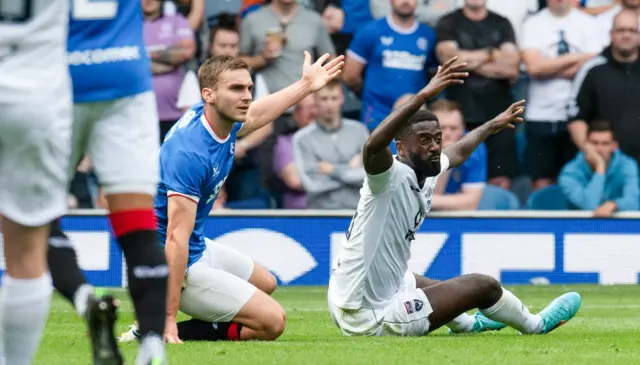 Rangers' James Sands and Ross County's Jordy Hiwula