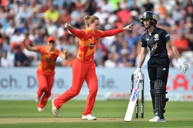 Kirstie Gordon celebrates bowling Amy Satterthwaite