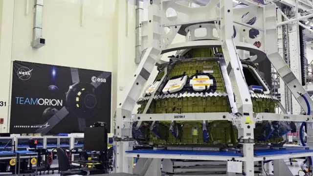 Nasa's Orion crew module stands in an operations building on Sunday