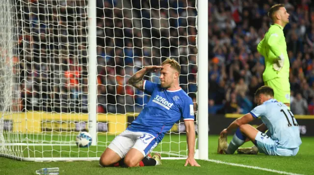 Scott Arfield salutes the home crowd after restoring Rangers' lead