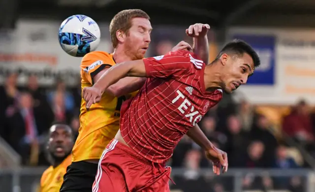 Aberdeen's Bojan Miovski (R) and Annan's Steven Swinglehurst during a Premier Sports Cup match between Annan Athletic and Aberdeen at Galabank,