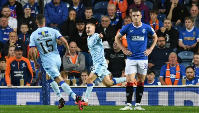 Lee Connelly celebrates a special goal for League 1 Queen of the South