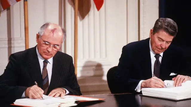 Ronald Reagan and Mikhail Gorbachev signing the Intermediate-Range Nuclear Forces Treaty in 1987