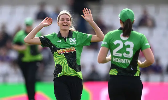 Lauren Bell celebrating her wicket