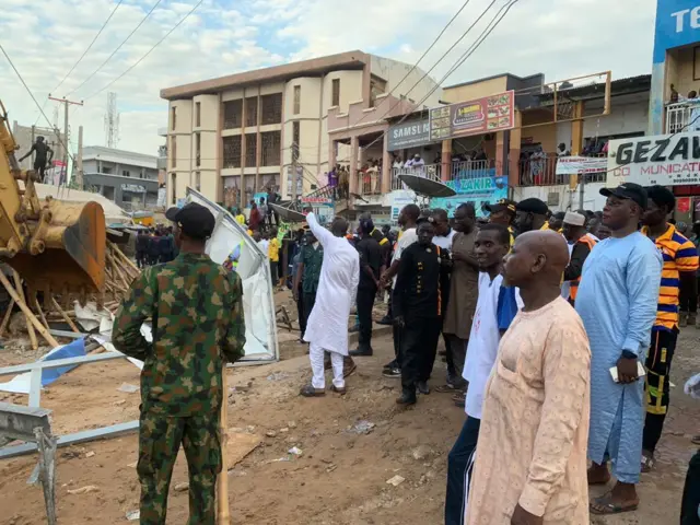 The three-storey building collapsed in a market