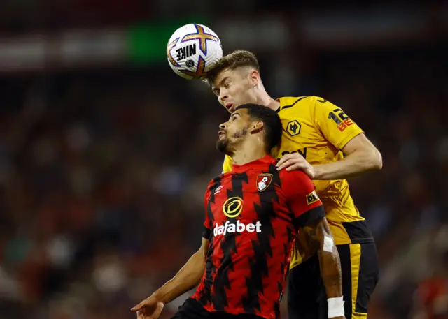 Nathan Collins in action with AFC Bournemouth's Dominic Solanke