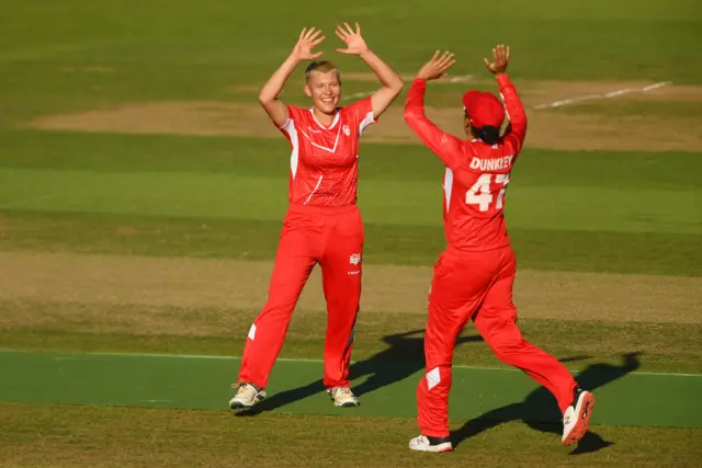 Issy Wong celebrates taking a New Zealand wicket in the Commonwealth Games