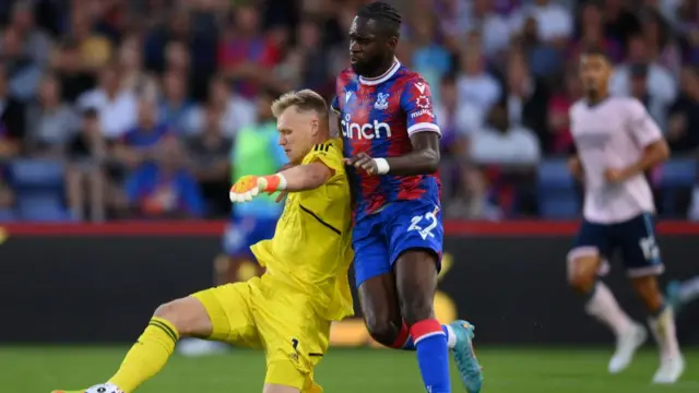 A photo of Aaron Ramsdale making a clearance