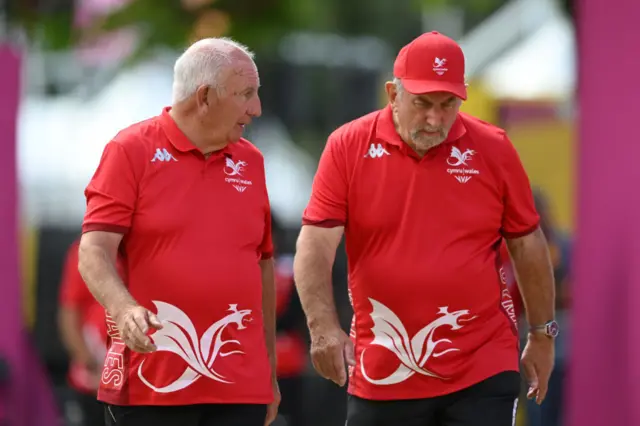 Welsh lawn bowler Gordon Llewellyn (right) and his director John Lewis during the mixed pairs B2/B3 gold-medal match at the Commonwealth Games