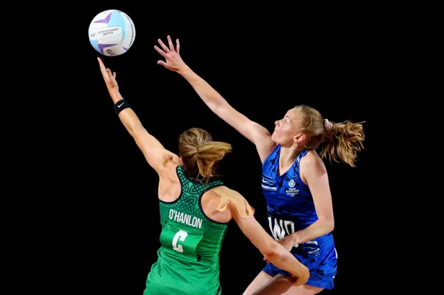 Caroline O'Hanlon and Claire Maxwell go for ball in Scotland v Northern Ireland game