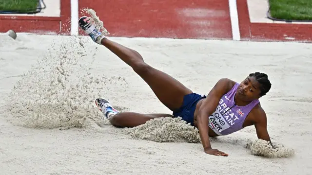 Britain's Naomi Metzger jumps at the 2022 World Championships