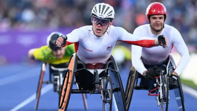 Para-athlete Nathan Maguire lands men's T53/54 1500m gold for England, pipping team-mate  Danny SIdbury who takes silver