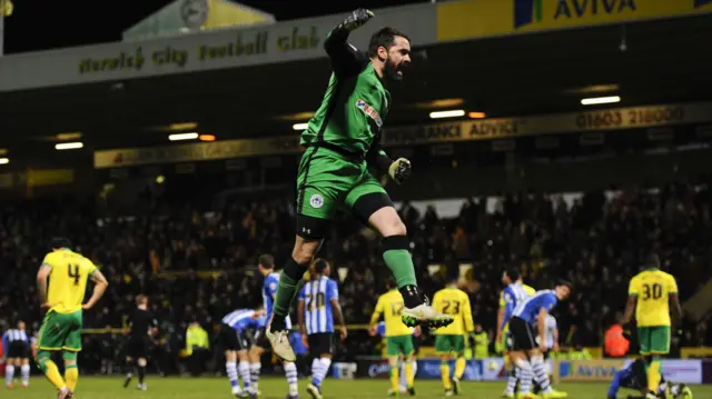 Then Wigan Athletic goalkeeper Scott Carson celebrates their most recent win away at Norwich City in March 2015