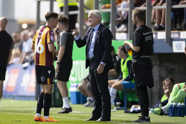 Bradford boss Mark Hughes gives some orders to a player