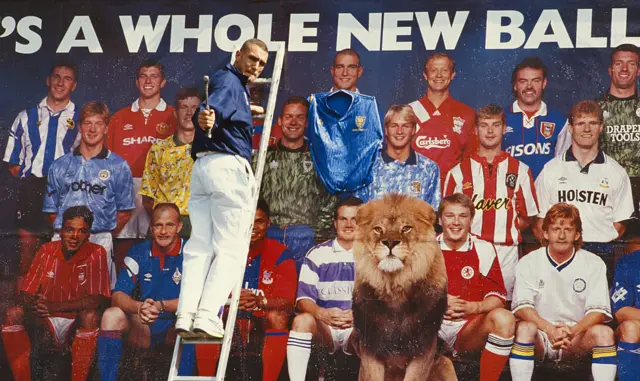 Vinnie Jones nailing a Wimbledon shirt to a Premier League billboard