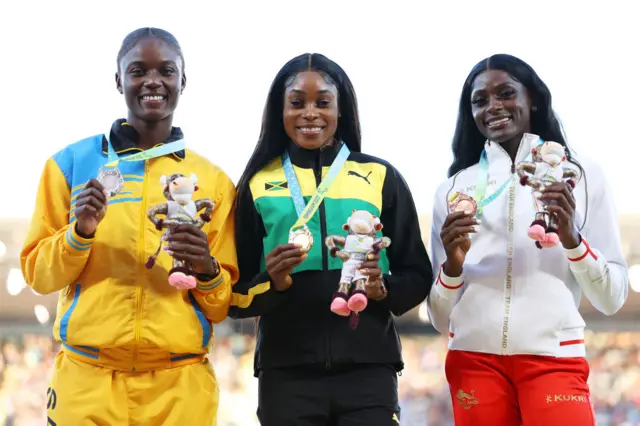 Elaine Thompson-Herah with 100m gold medal