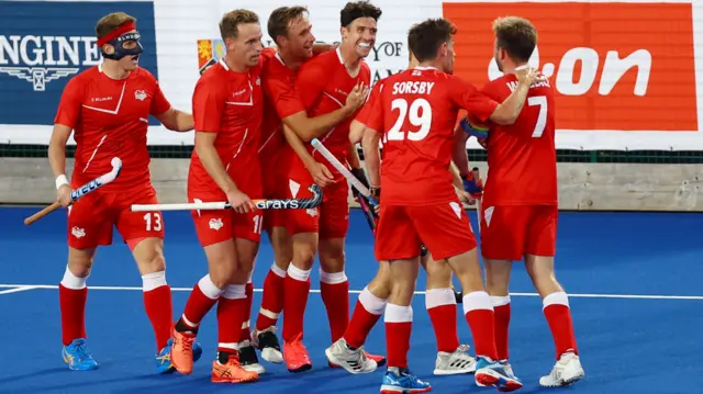 England hockey team celebrate