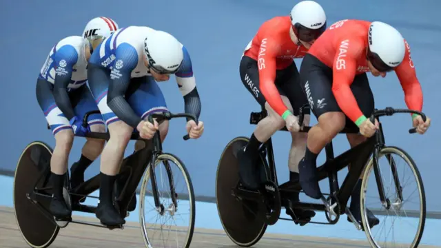 Wales' James Ball and pilot Matthew Rotherman compete for the gold medal against Scotland's Neil Fachie and pilot Lewis Stewart