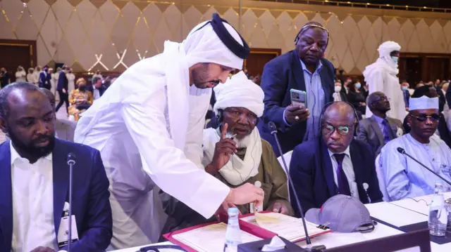 Chad's transitional military authorities and rebels sign an agreement for a national dialogue, in Doha