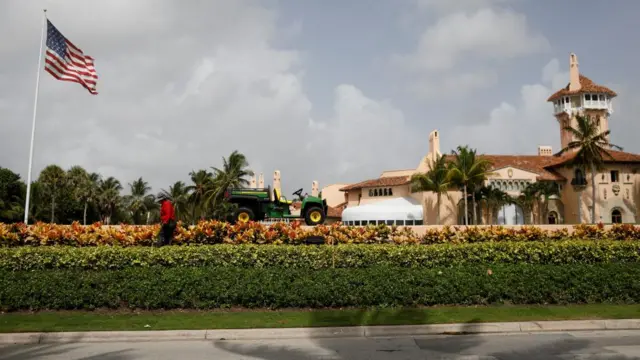 A gardener works at Trump's Mar-a-Lago home after former US President Donald Trump said FBI agents raided it, in Palm Beach, Florida, US