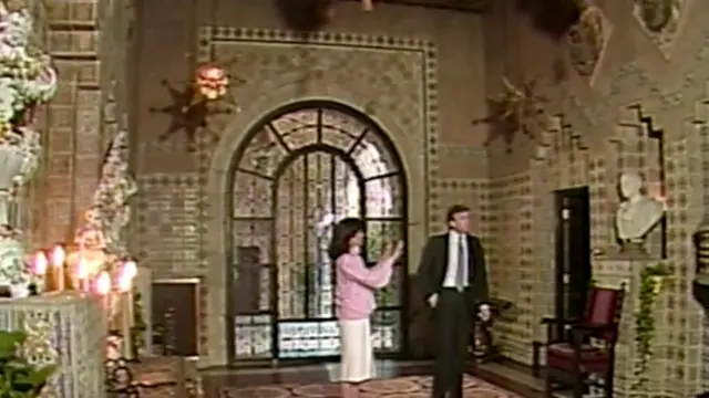 Mar-a-Lago's grand entrance hall, with statues and chandeliers