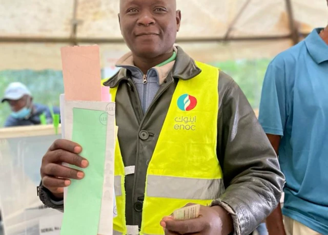 A voter in Kisumu, Kenya