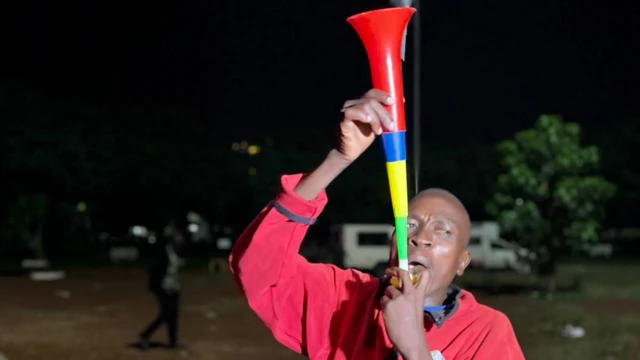 A man with a vuvuzela in Kisumu, Kenya