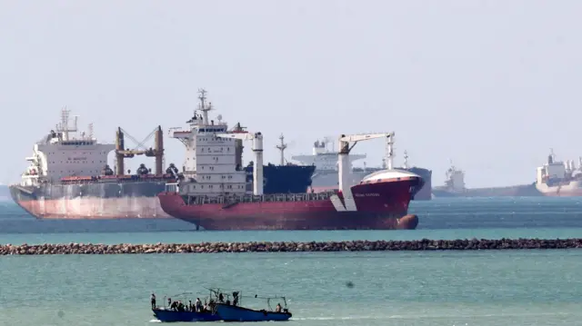 Ships and boats are seen at the entrance of Suez Canal in this file photo