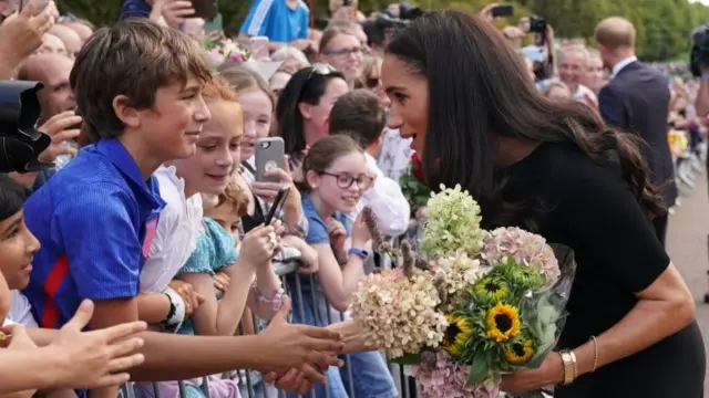 The Duchess of Sussex on a walkabout to meet members of the public at Windsor Castle in Berkshire