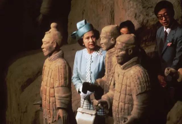 The Queen viewing some of the Terracotta Army soldier statues during a state visit to China in 1986