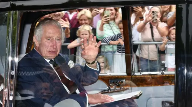 King Charles III arrives at Buckingham Palace