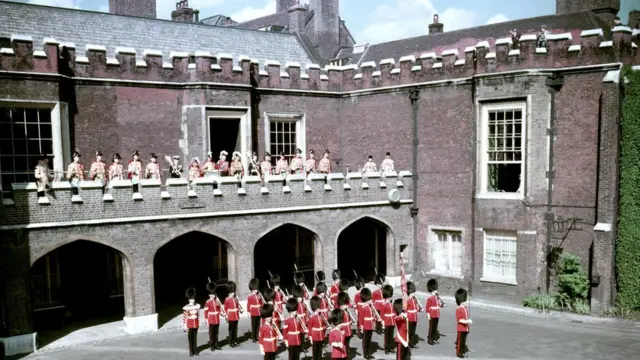 File photo dated 8/2/1952 of The Garter King of Arms, Sir George Bellew, reading the first public proclamation of the accession of Queen Elizabeth II, at Friary Court, St James's Palace