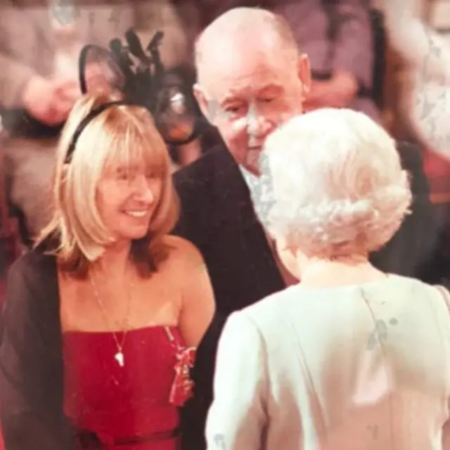 Tony and Maureen Coumbe receiving their MBE