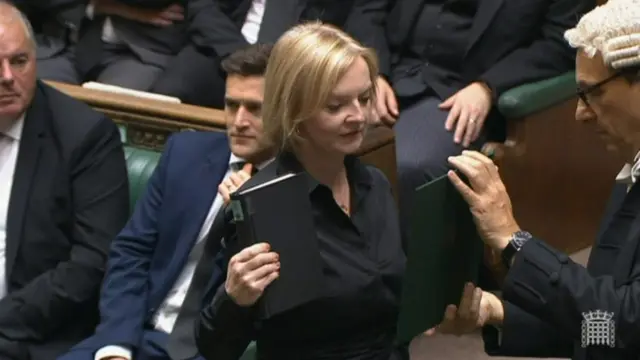 UK Prime Minister Liz Truss pledges allegiance to King Charles III at the House of Commons in London