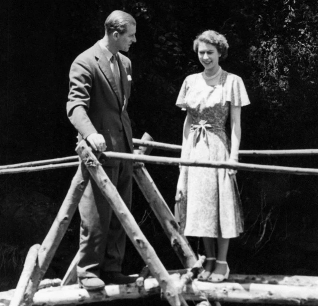 Princess Elizabeth is seen here at Treetops Hotel in Kenya with her husband, the Duke of Edinburgh in 1952