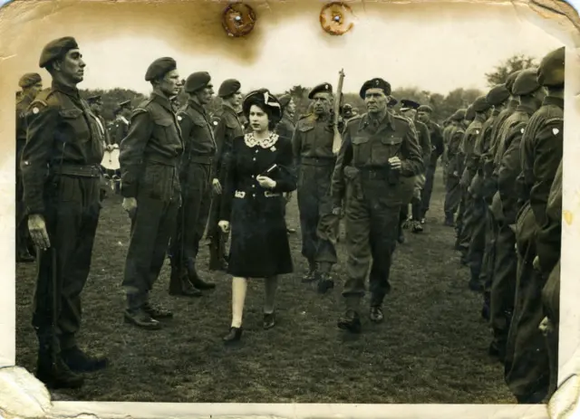 The Queen, aged 18, photographed in May 1944 visiting the Grenadier Guards in Hove