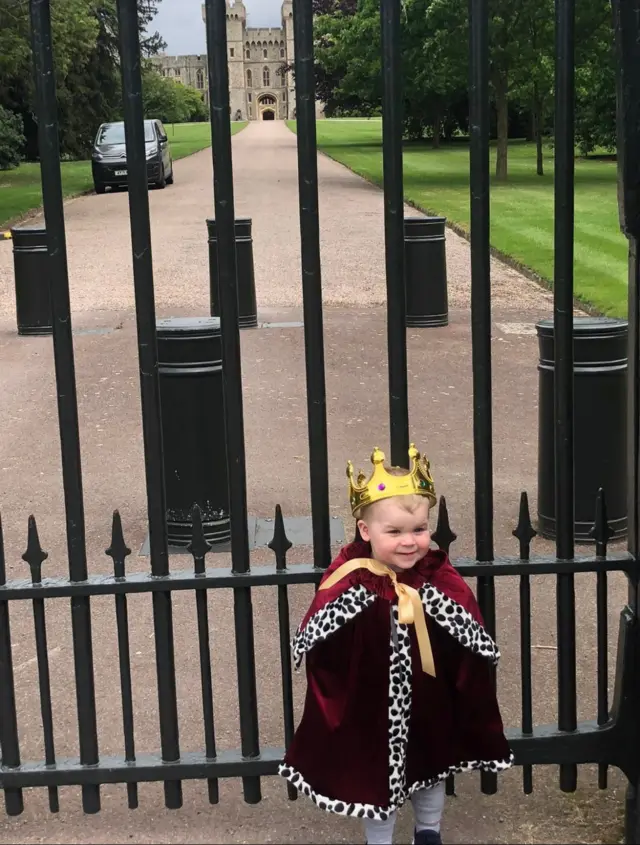 Two-year-old Arthur stood outside the gates of Windsor on May 25